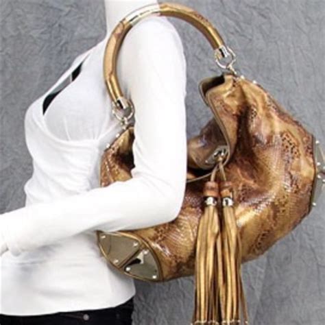 gucci white babouska hobo with bamboo tassels|Gucci babouska handbags.